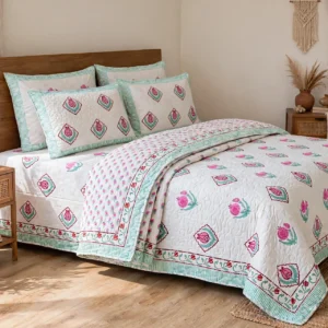Handblock Jaipuri printed 6-piece cotton comforter set with quilted comforter, bedsheet and matching pillow covers, styled for elegant bedroom décor.